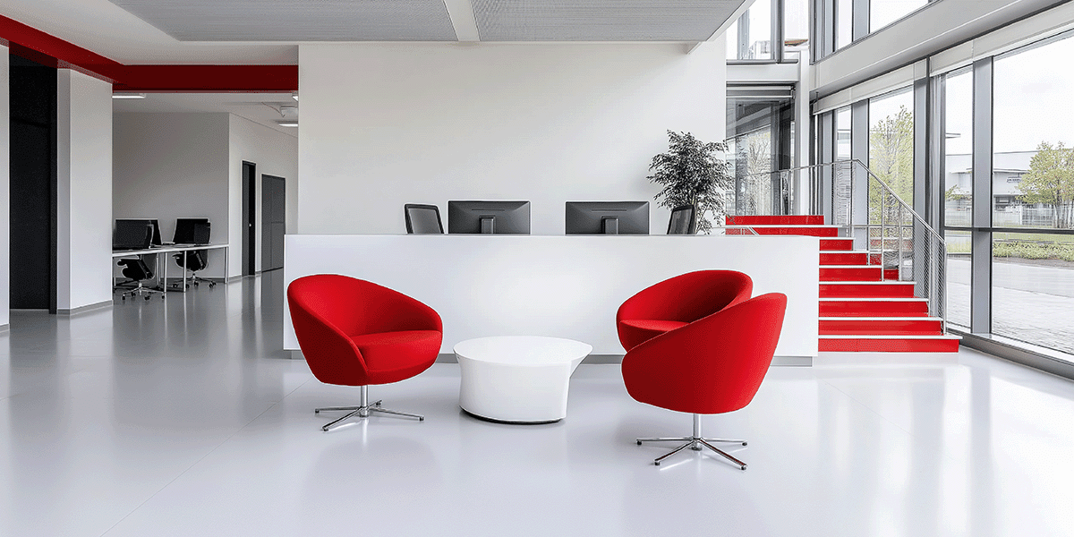 White Office Reception Area with Red Accent Colours